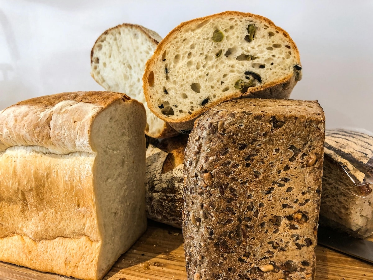 Various types of bread displayed together, offering a range of options for women with PCOS.