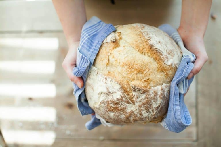 Fresh sourdough bread, showcasing gluten products can be used in a PCOS friendly diet.