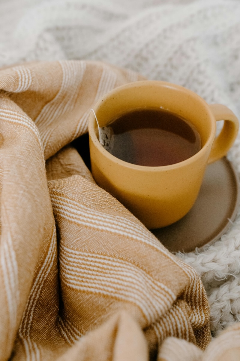 Warm cup of herbal tea to indirectly support collagen production and reduce inflammation in PCOS.