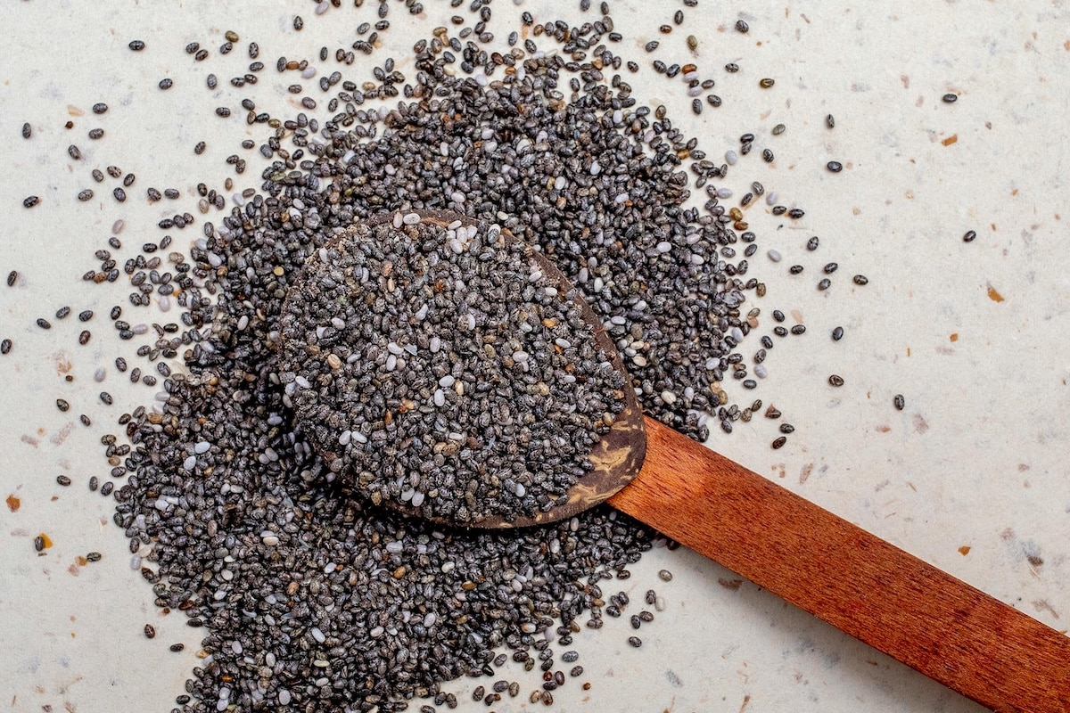 A tablespoon of chia seeds—tiny but powerful, these fiber-rich seeds support blood sugar balance in a high-fiber PCOS meal plan.